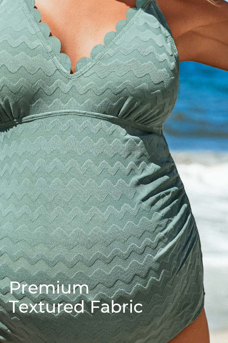 elegant v-neck maternity one-piece swimsuit with scalloped trim#color_balsam-green